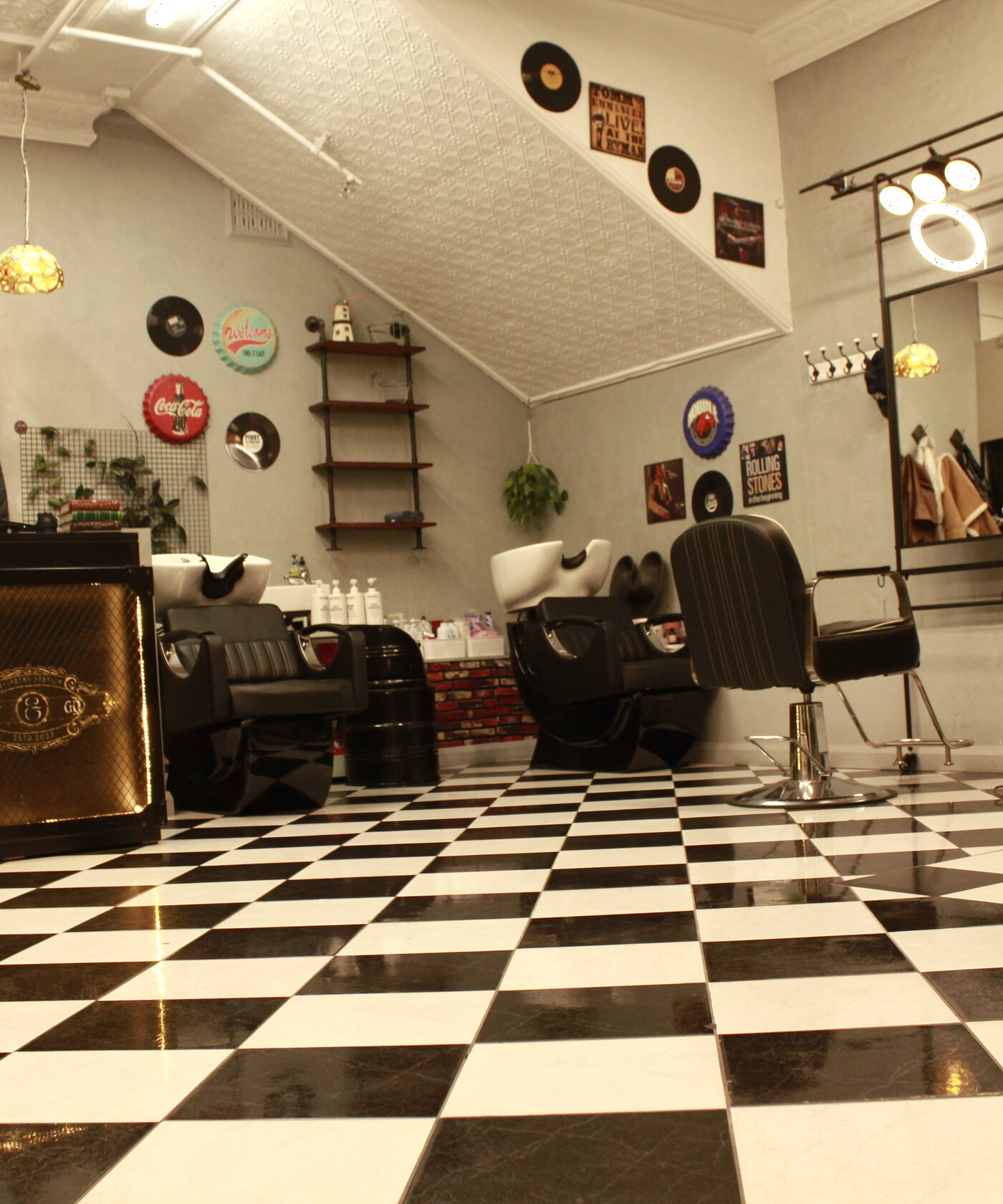 Vintage Cut and Go salon interior with checkerboard floor