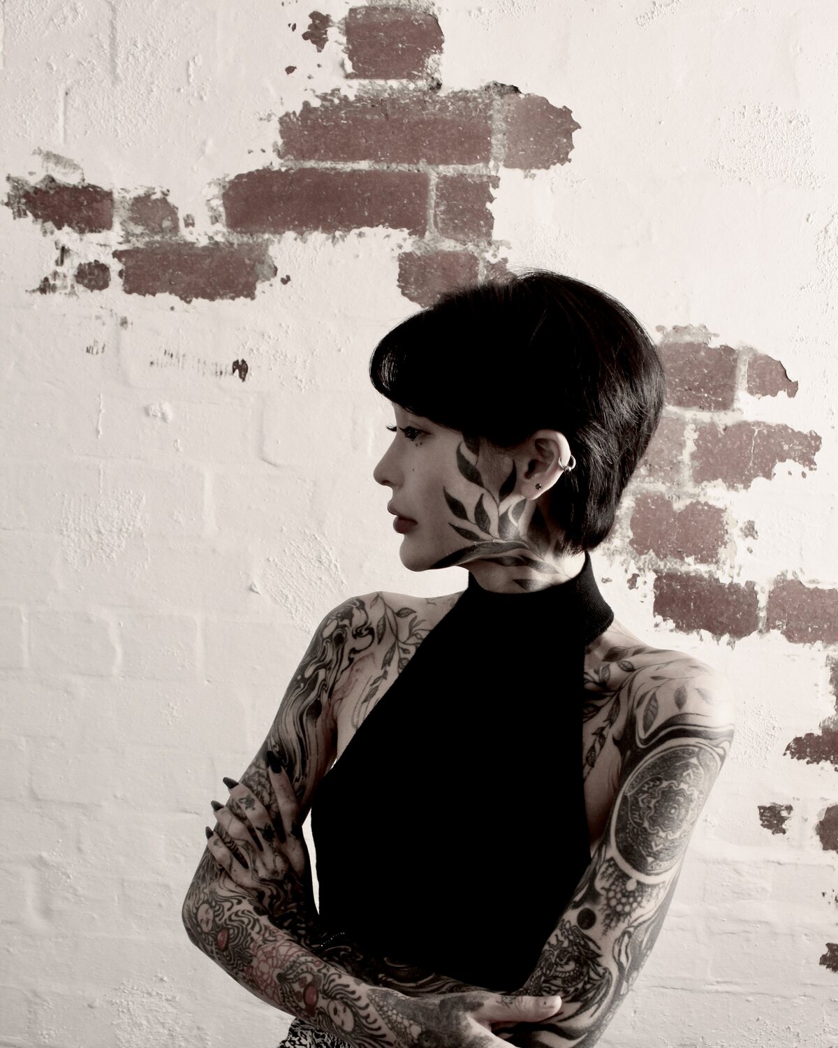 Salon portrait with a short black hairstyle